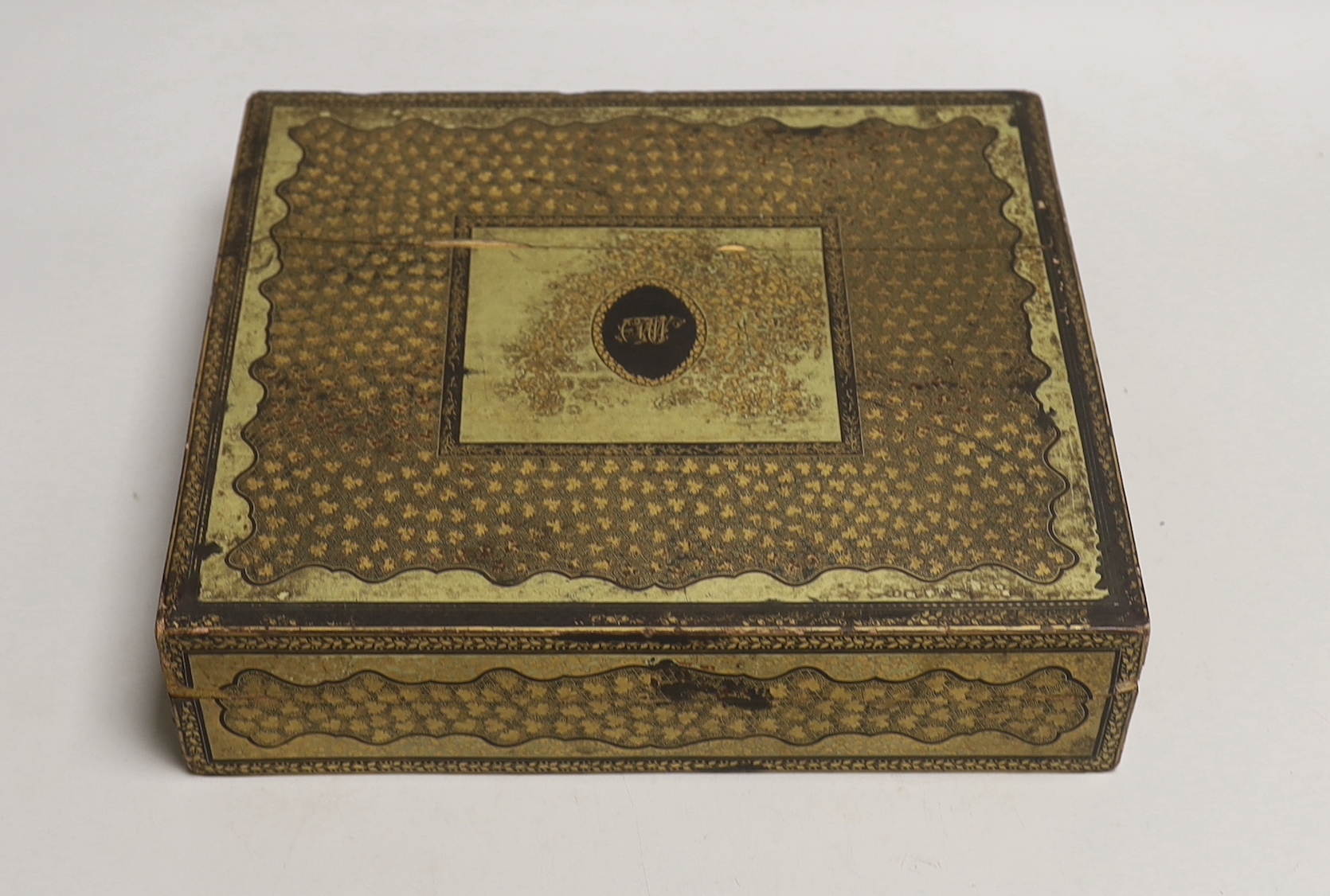 A 19th century Chinese export lacquer games box and mother of pearl counters